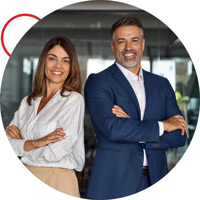 Two smiling business team members standing shoulder to shoulder
