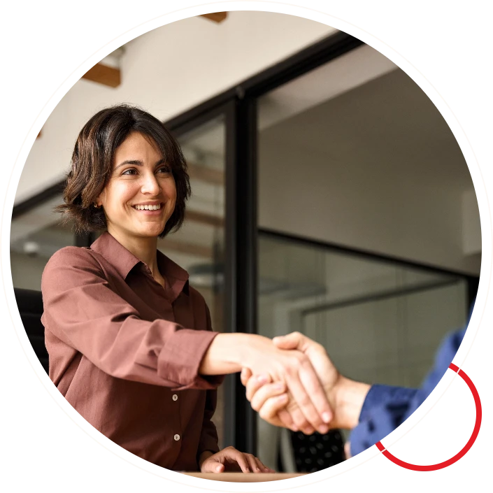 Woman shaking hands in office