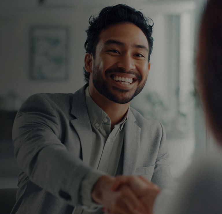 Professional man smiling shaking hands conflict resolved mobile